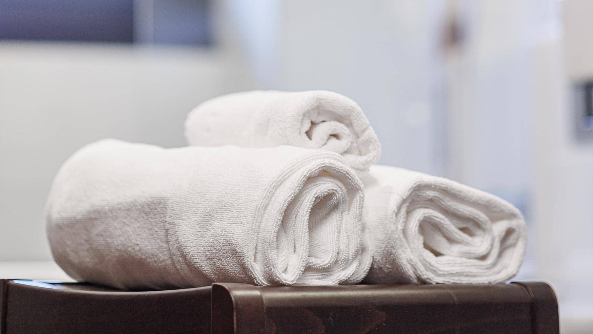 Detalle de tres toallas de ducha